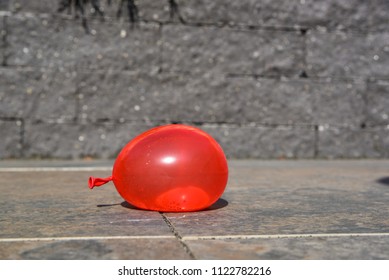 Water Ballon On The Ground.