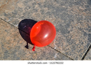 Water Ballon On The Ground.