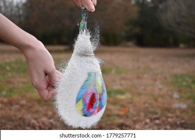 Water Ballon Popping In Motion.