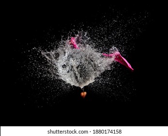 Water Balloon Explosion On Black Background