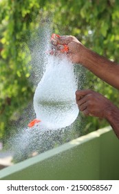 Water Balloon Poping With Pin 