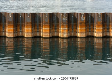 Water Barrier, Water Dam Made Of Steel Profiles In A Construction Site In The Lake.