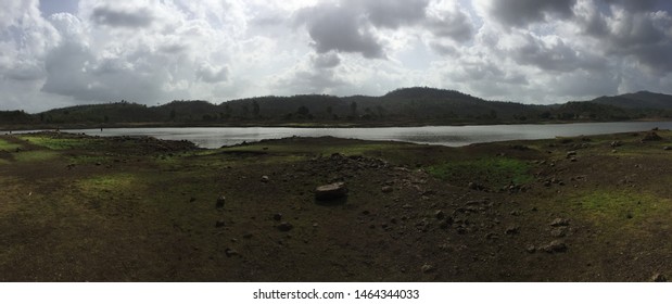 water body landscape with dramatic clouds