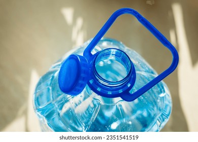 Water bottle with attached cap for easy collection and recycling. Tethered Cap. Litter prevention EU Directive 2019904.