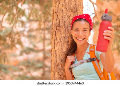 Water Bottle To Bring On Hike For Heat Dehydration Hydration. Happy Asian Hiker Drinking To Stay Hydrated On Summer Trail Walking Outdoor. Woman Camping With Backpack