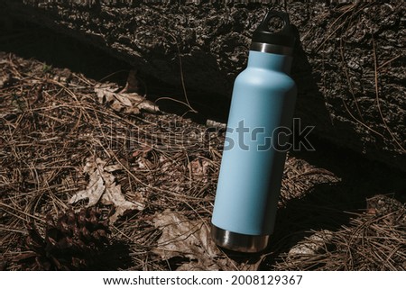 Water bottle in the forest