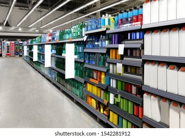 Water bottles on shelf in supermarket suitable for presenting new water bottles and packaging among many others.