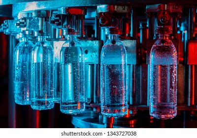 Water bottling line for processing and bottling pure spring water - Powered by Shutterstock