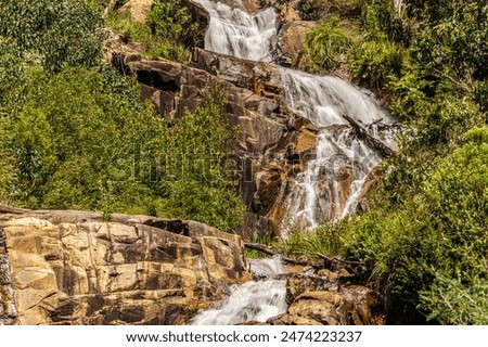 Water Bouncing Over Two Rock Shelves