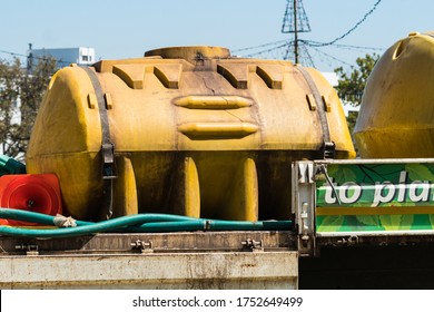 Water Bowser Delivering Non Potable Water For Use In Drought Conditions In Garden Irrigation In South Africa Deliberate Focus On The Tank