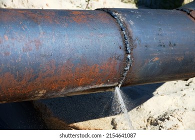 The water broke through an iron water pipe (busted watermain). Lack of water saving, loss of drinking water