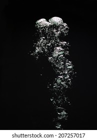 Water bubbles on black background - Shutterstock ID 207257017
