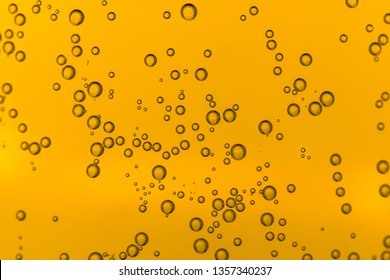 Water bubbles on orange background