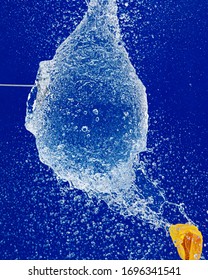 The Water Bursting Out Of A Ballon With Intention To Abstraction/formation.