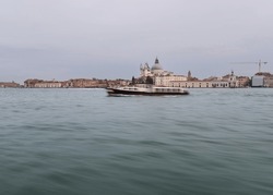 Water Bus Passing Navigating In The Canal In Venice, Italy  Motion Blur