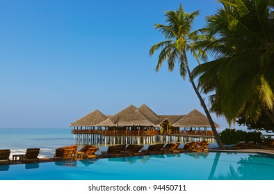 Water cafe and pool - Maldives vacation background