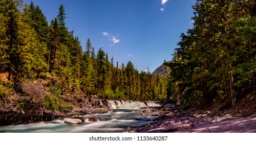 A Water Cascade Graces The Hiker Who Travails The Johns Lake Loop Trail In Glacier National Park.