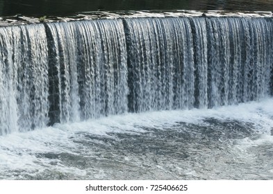 water cascade streaming down a lasher
