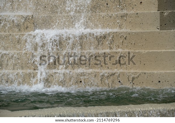 Water Cascading Down Side of\
Steps