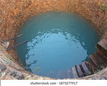Water comes out of the well - Shutterstock ID 1873277917