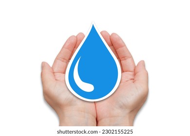 Water conservation and safe drinking water concept. Human hands holding blue water drop. - Shutterstock ID 2302155225
