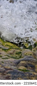 Water Crashes Into Rocks, Wet Stones