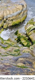 Water Crashes Into Rocks, Wet Stones