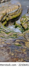 Water Crashes Into Rocks, Wet Stones