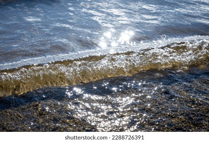 Water crests onto the beach at Milford Lake, Kansas, Oct. 29, 2022. Milford Lake, the largest lake in Kansas, has been a common go-to for the 1st Infantry Division and Fort Riley Soldiers for its clos