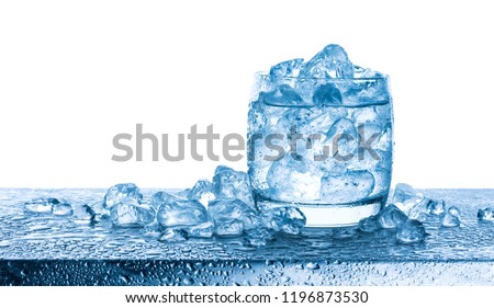 Water with crushed ice cubes in glass isolated on white background with copy space