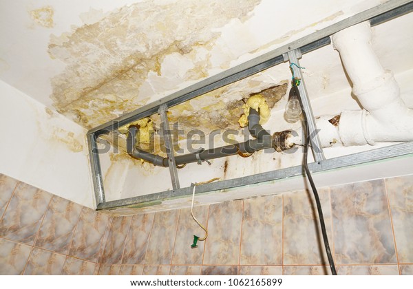 Water Damage Condo Bathroom Ceiling Flooding Stock Photo