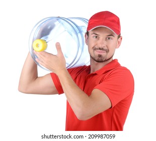 Water Delivery. Cheerful Young Deliveryman Holding A Water Jug While Isolated On White