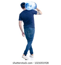 Water delivery man in blue t-shirt and cap go goes on white background isolation, back view