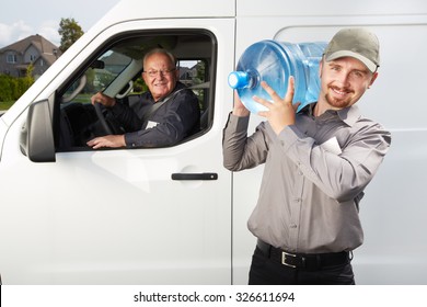 Water Delivery Service Man With Big Bottle. 