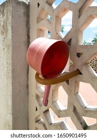 Water Dipper Been Hang At The Mosque Wall With Hose.