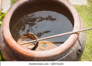 Water Dipper Made From Coconut Shell And Clay Pot