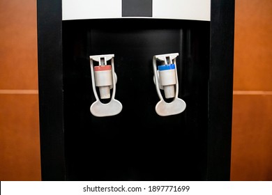 Water Dispenser In Cooler Close Up In Office.