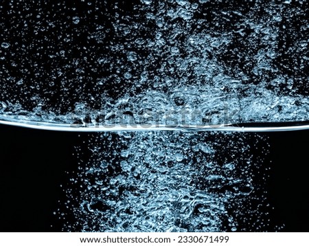 
water dispersion clearly separated layers of water on a black background
