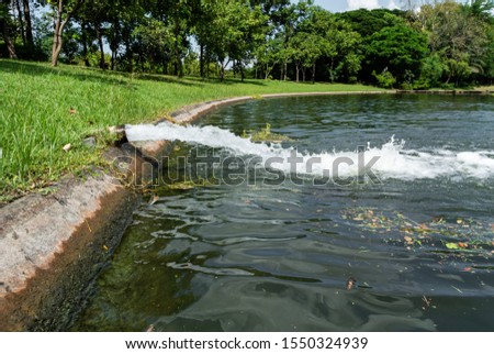 Water drainage by pipe into a pond