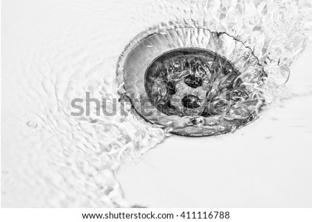 water draining in washbasin
