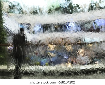 Water Dripping Down On A Glass Wall With Bokeh And Blurry Of Human.