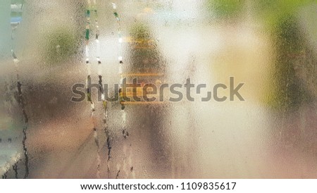 water drop abstract background and texture with glow sunlight in morning rainyday