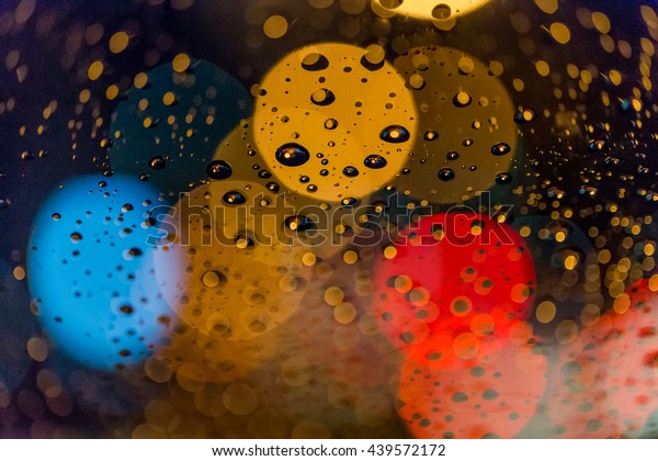 water drop\
after mirror inside the car with\
bokeh