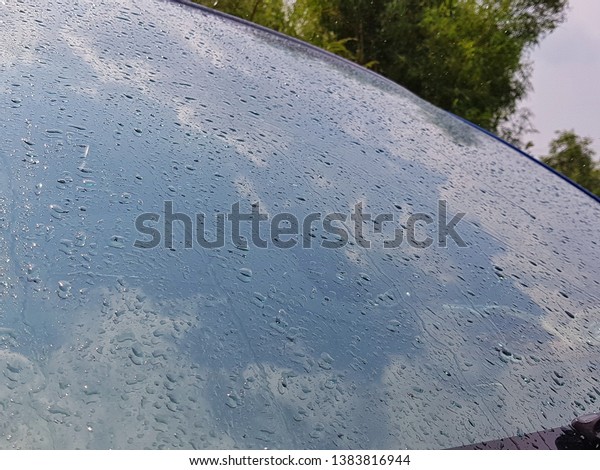 water drop on car\
glass
