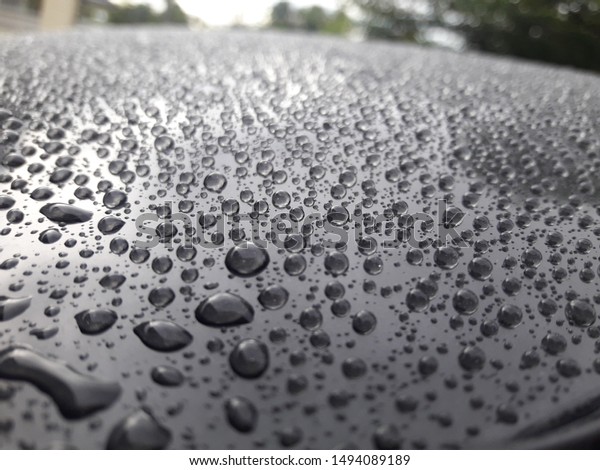 water drop on the car\
roof,rain