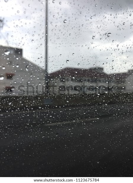 Water drop on the window of\
car
