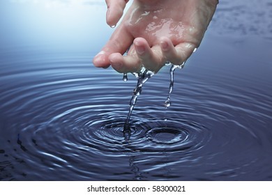 Water Drop From Woman Hand