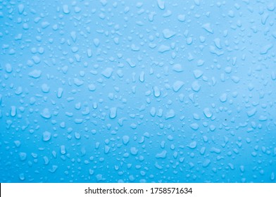 Water droplet on the car hood. Water beading after rain or car wash on white shiny paint surface. Beading created by ceramic coat or paint sealant with high surface tension. Water drop Backgroud. - Shutterstock ID 1758571634