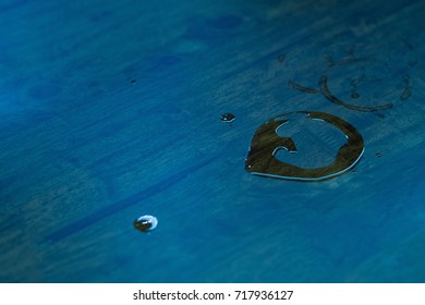 Water droplet  on wood table.Water stain
