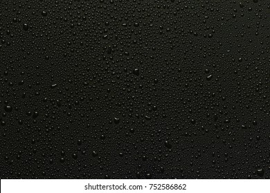 Water droplets black background